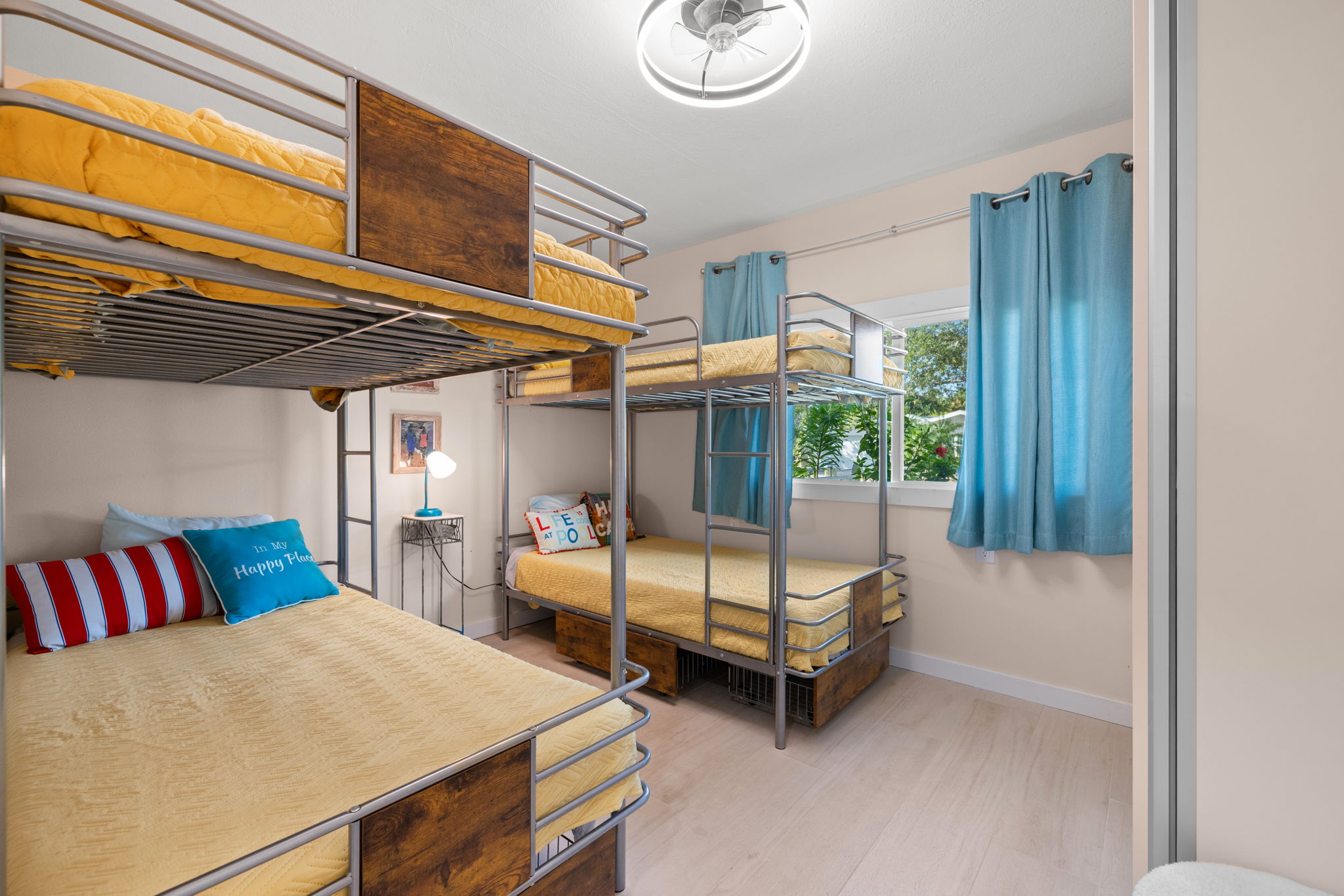 Smart bunk bedroom design in Indian Rocks Beach short-term rental investment property showing multiple bunk bed configurations maximizing sleeping capacity within the 10 guest occupancy limit under IRB Ordinance 2023-02 - strategic bedroom design drives higher nightly rates and group bookings